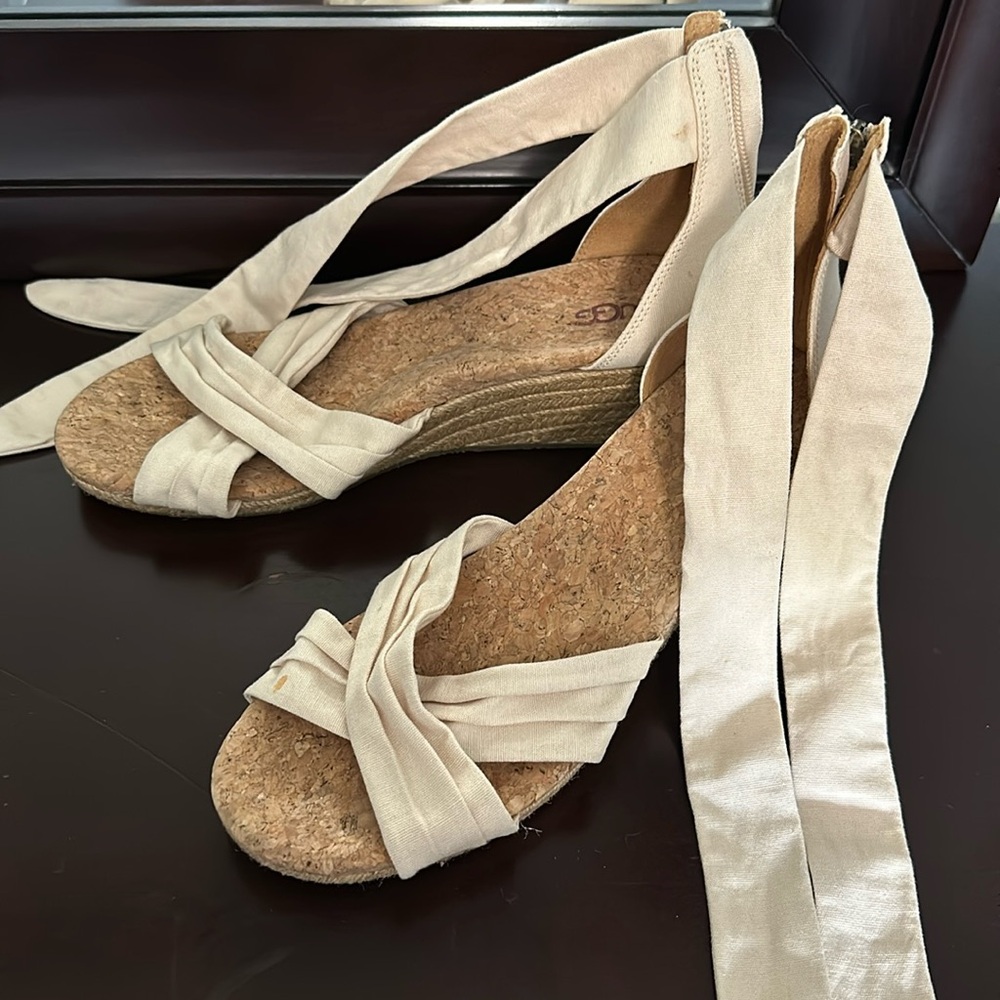 Ugg cream tan colored wedges with back zip and tie around ankle size 10!